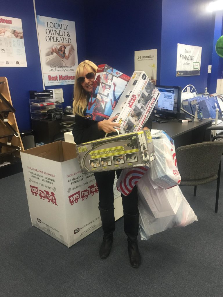 Toys for Tots donation at Best Mattress Blue Diamond Locaiton