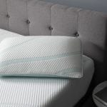 Tempurpedic pillow on a bed