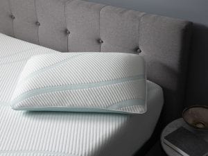 Tempurpedic pillow on a bed
