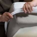 adding a mattress protector