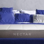 Nectar mattress with blue and white pillows