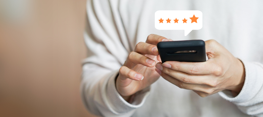 Customer giving 5-Star rating on smartphone
