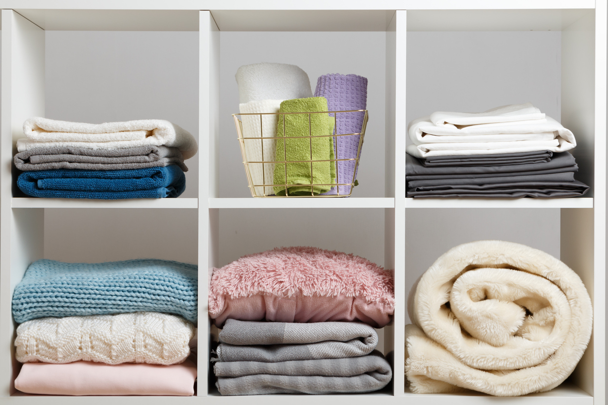 Folded linens in compartments