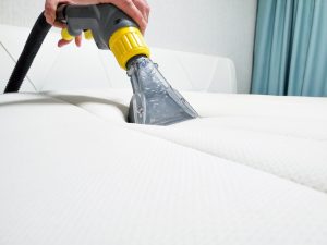 Vacuuming a mattress