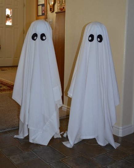 2 barstool ghosts using bed sheets