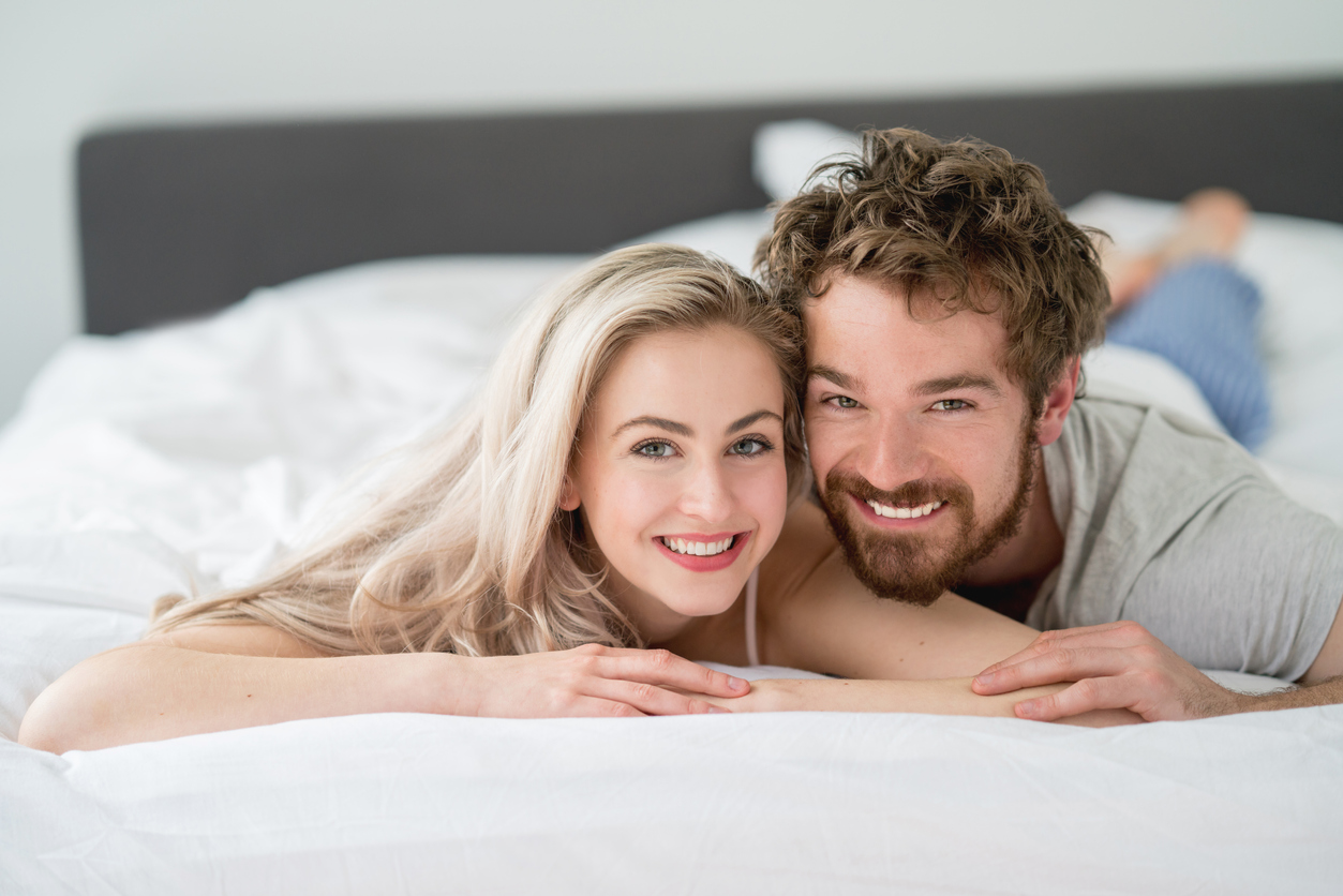 A couple on a firm mattress