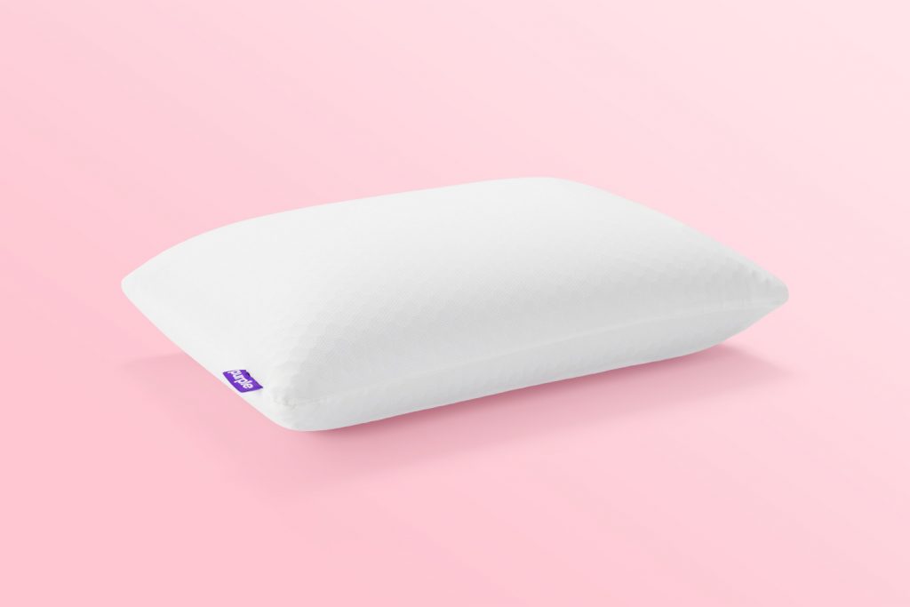 Purple Harmony™ Pillow over pink background