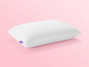 Purple Harmony™ Pillow over pink background