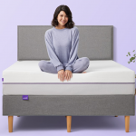 A woman sitting on a Purple Mattress