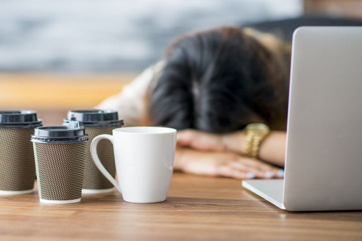 Woman sleeping at work