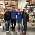 Best Mattress team members helping pack food at Three Square in Las Vegas